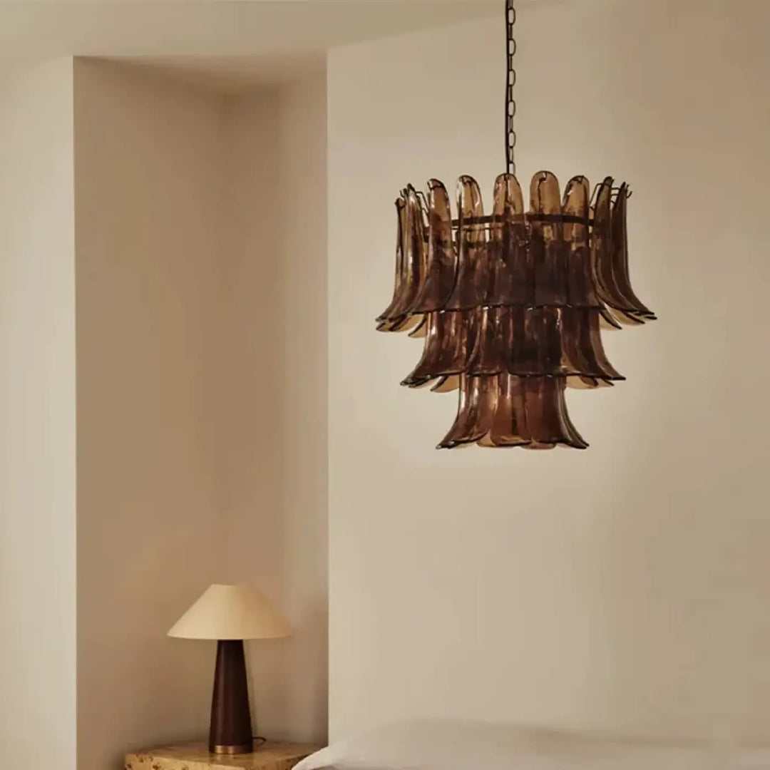 Suspension luminaire vandis avec verre sculpté ambré effet cascade suspendue par chaîne en métal sombre