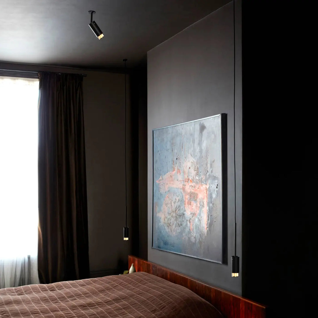 Luminaire Exhaust graphite finition laiton dans un intérieur #couleur_dor