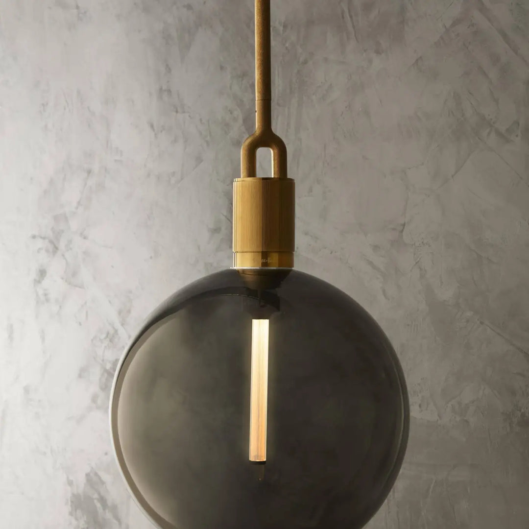 Luminaire Forked dans un salon #couleur_dor