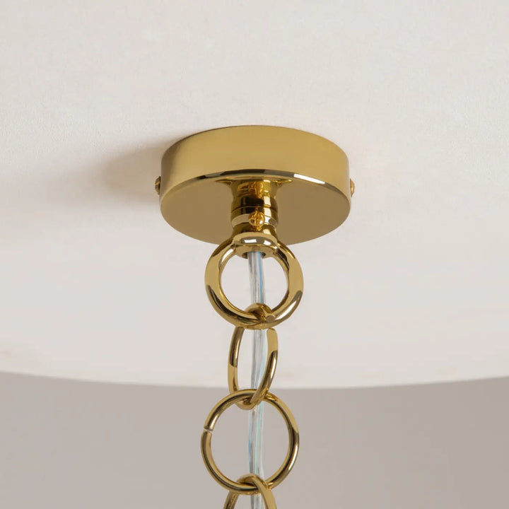 Suspension luminaire frame en métal doré avec chaîne circulaire et plaque de fixation en laiton poli pour cadres géométriques