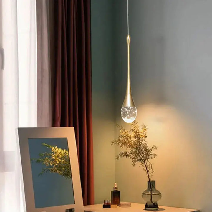 Suspension goutte dorée élégante en version 1, 2 ou 3 lampes