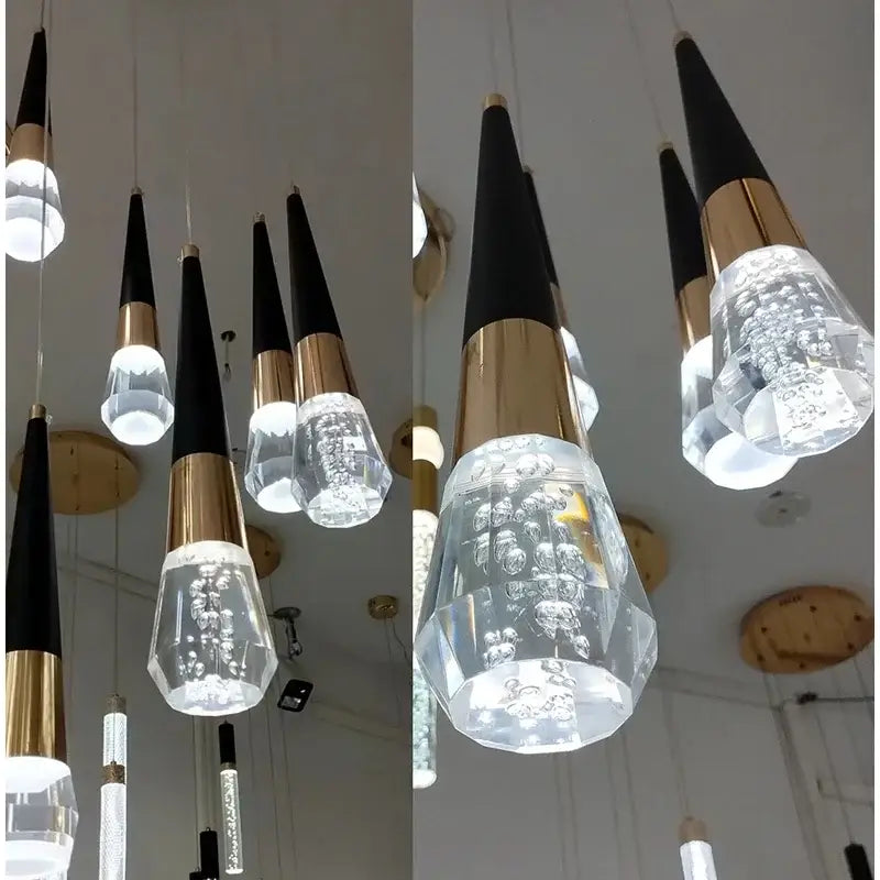 Suspension Goutte Noire Et Dorée Avec Bulle De Verre Élégance