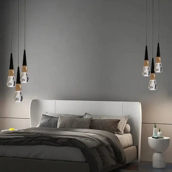 Suspension Goutte Noire Et Dorée Avec Bulle De Verre Élégance