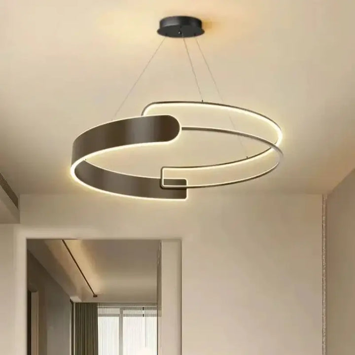 Suspension LED anneaux entrelacés design futuriste et épuré

