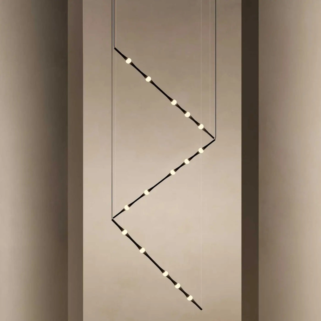 Détail de la structure en aluminium noir de la suspension Dew