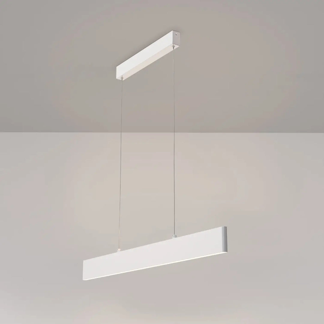 Suspension led blanche rectangulaire step linéaire avec design minimaliste et câbles fins pour ligne lumineuse d’une table