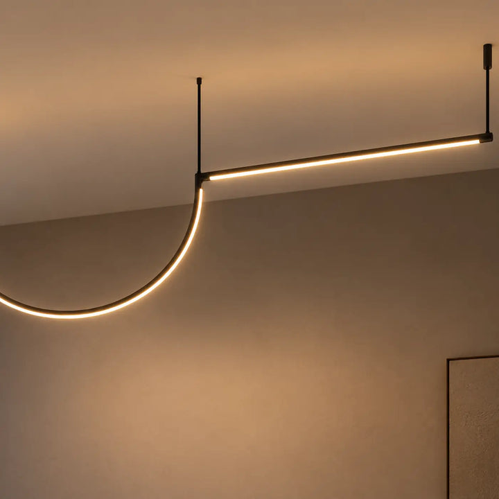 Suspension tubs modular led en aluminium noir avec mini rosace encastrée et éclairage chaud incurvé moderne