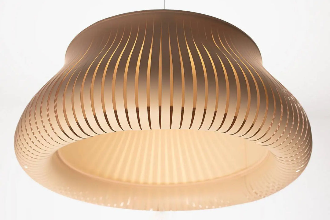 Suspension luminaire oblo beige en papier gaufré avec une lumière douce et diffuse pour un éclairage chaleureux