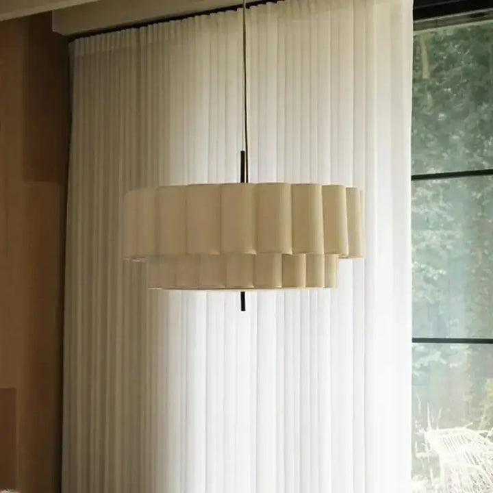 Suspension luminaire blanc crème en forme de cannelé moderne

