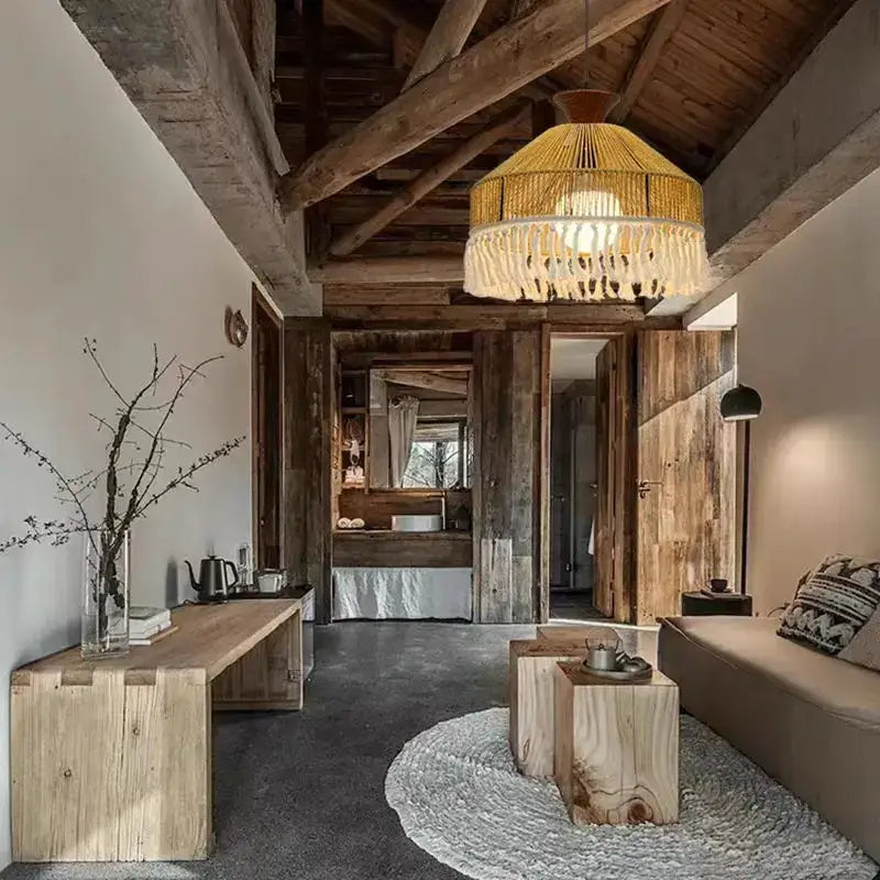 Suspension luminaire bohème en rotin naturel avec franges chic