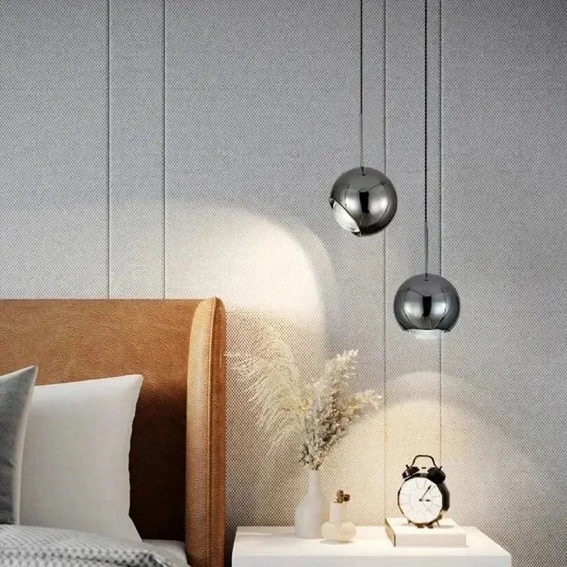 Suspension luminaire boule en verre effet miroir contemporain