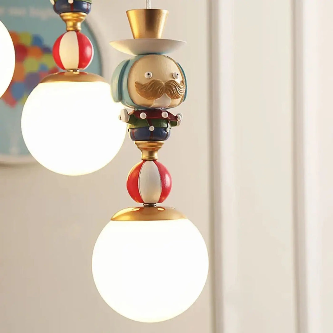 Suspension luminaire nik clown colorée avec finition brillante et accents dorés luminaire décorative originale