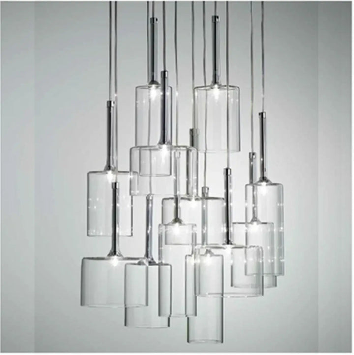 Suspension luminaire cylis design moderne en verre cylindrique avec tiges métal chrome et ampoules visibles