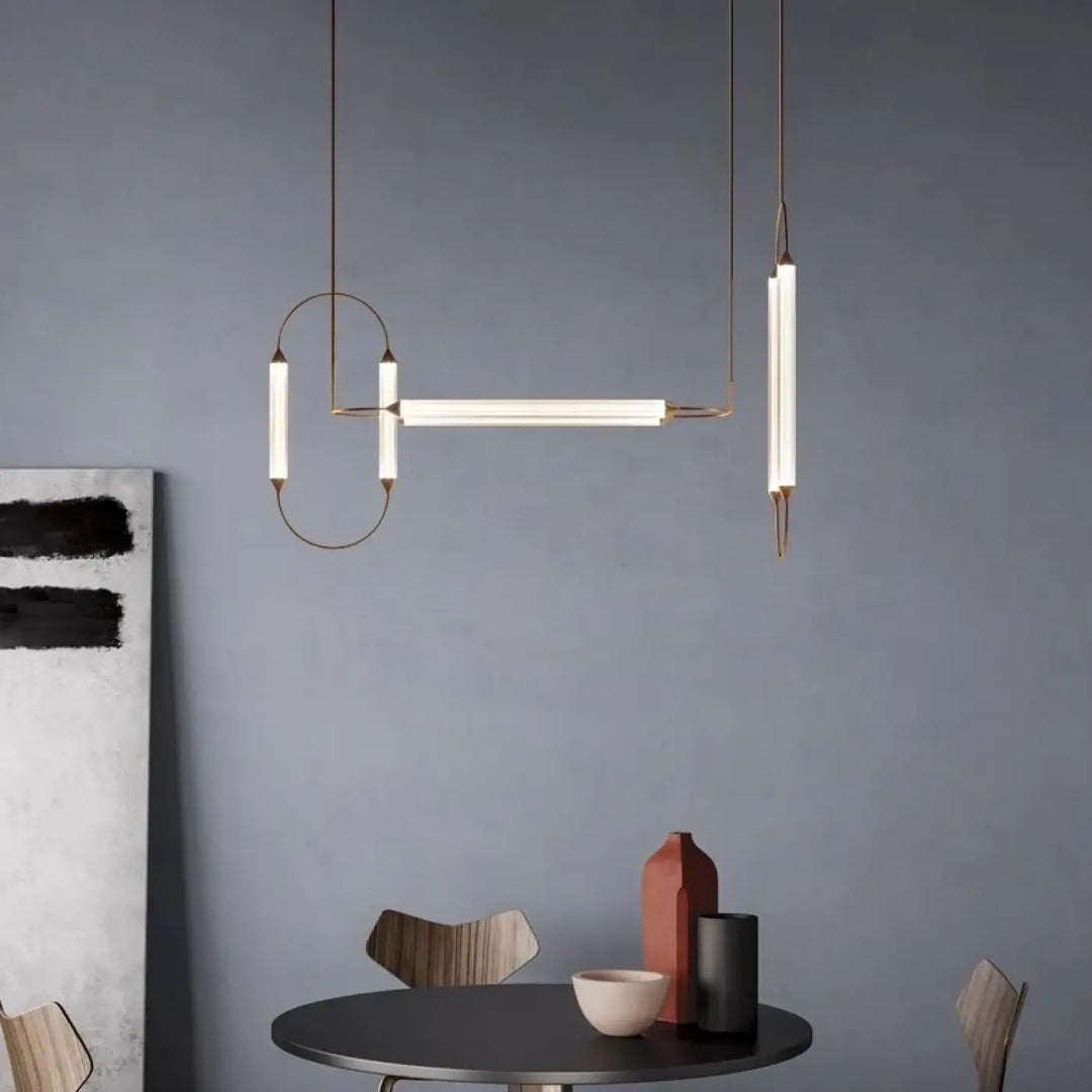 Suspension luminaire orsen avec sources lumineuses cylindriques blanches et cadre métallique ton laiton en seule couleur