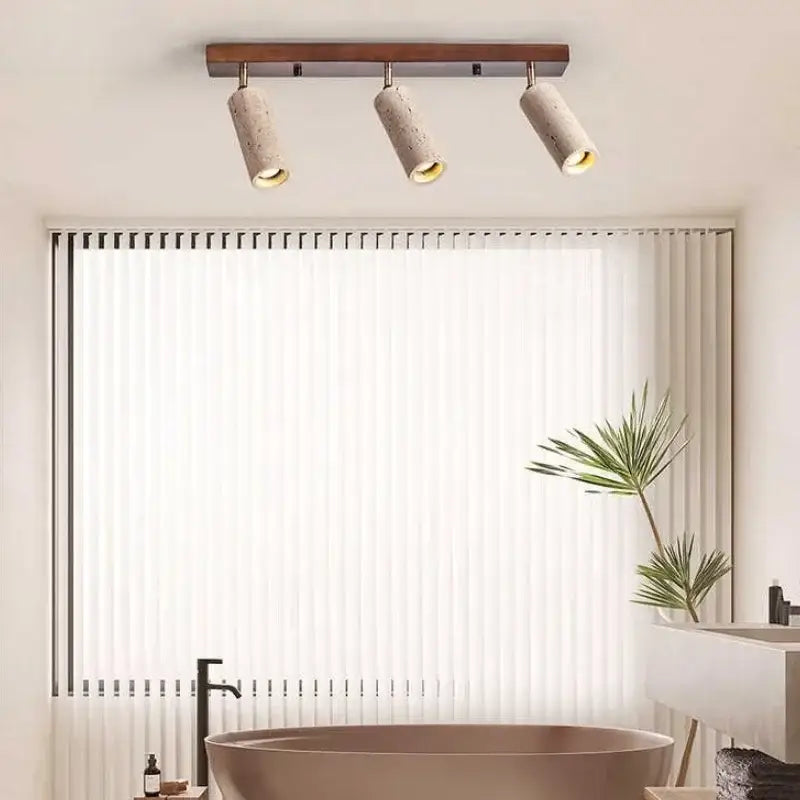 Suspension design industriel en pierre et métal élégant