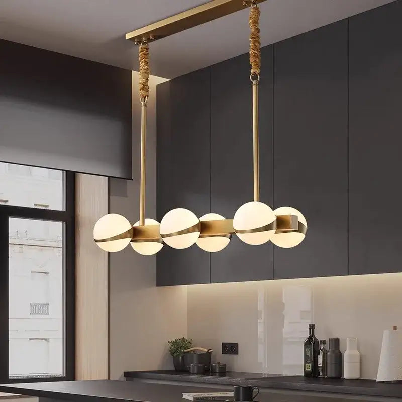 Luminaire suspendu design linéaire doré et corde style moderne