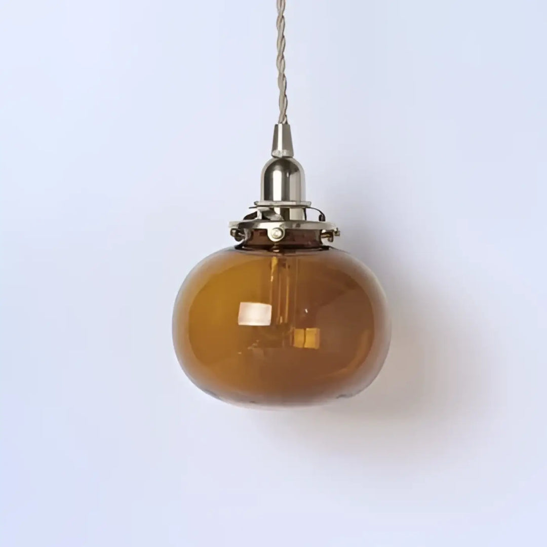 Suspension luminaire design verre et base dorée élégance moderne