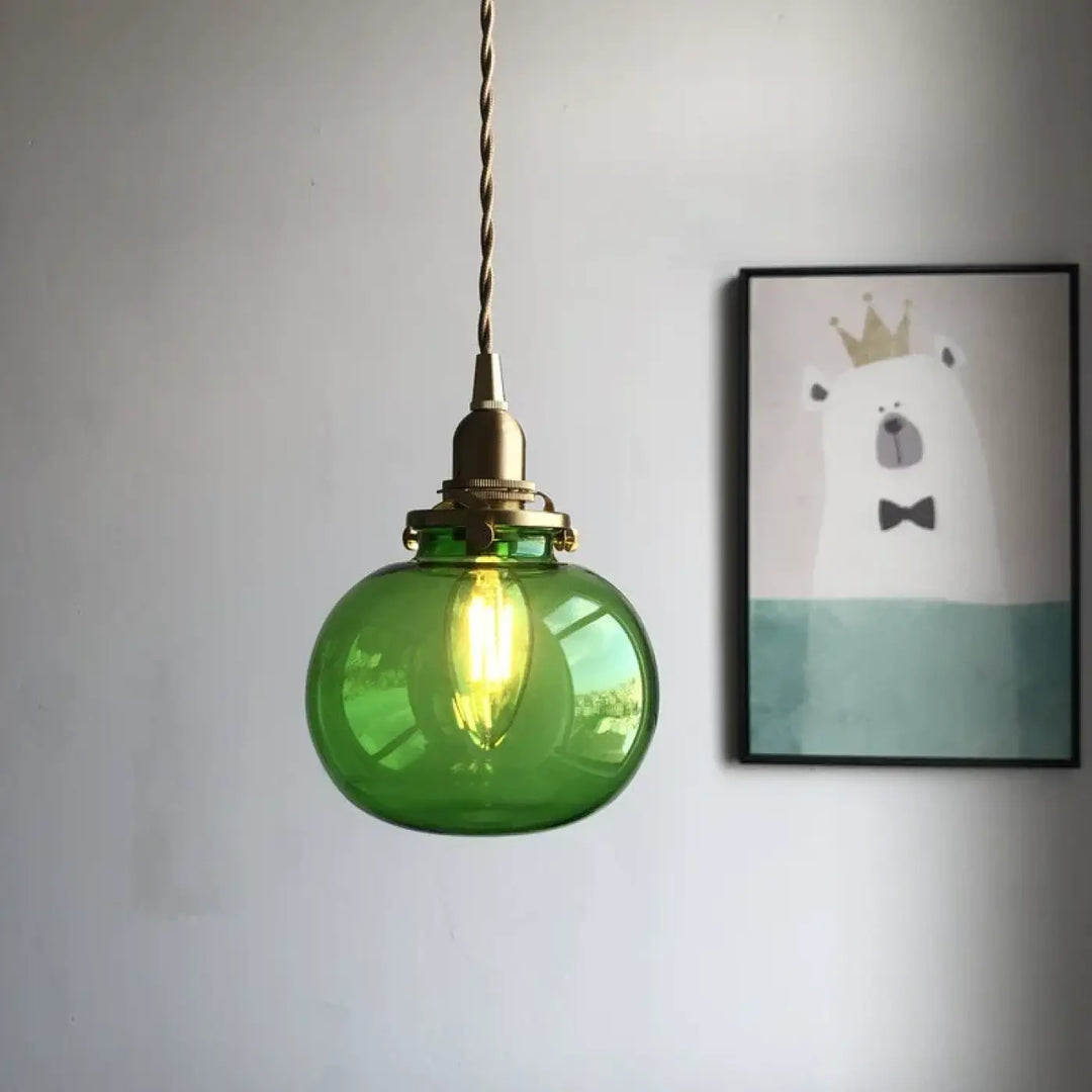 Suspension luminaire design verre et base dorée élégance moderne