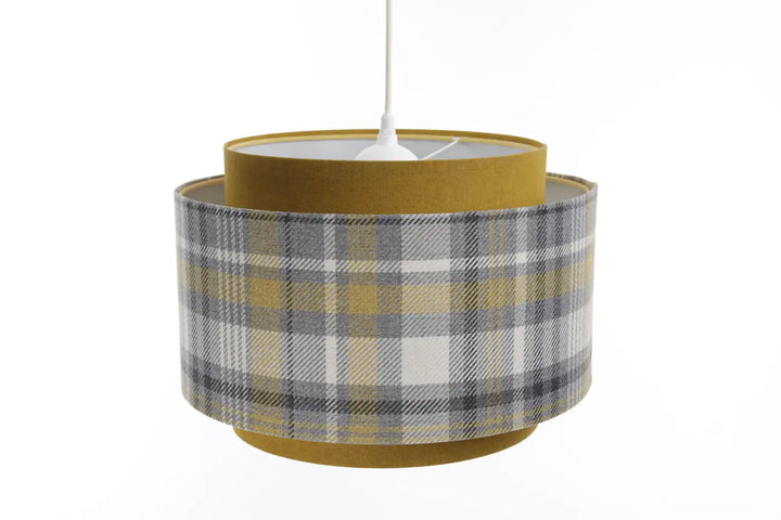 Suspension luminaire doblo avec abat-jour cylindrique en tissu gris et jaune moutarde à motif carreaux