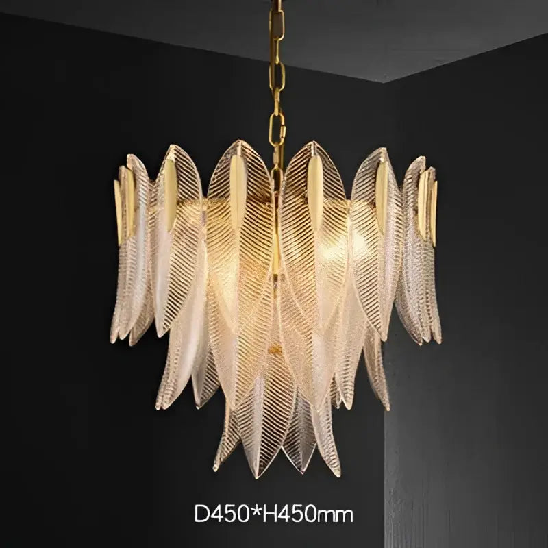 Suspension luminaire dorée en verre sculpté style art déco chic