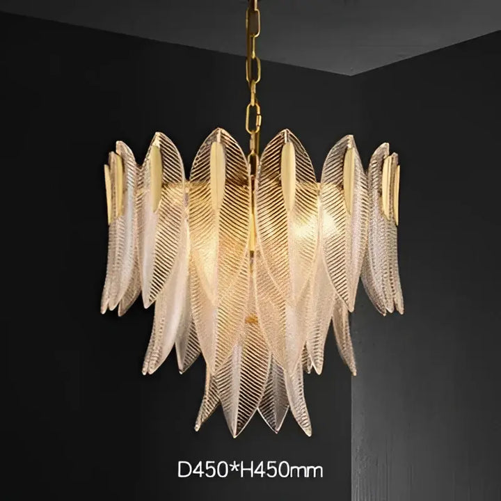 Suspension luminaire dorée en verre sculpté style art déco chic