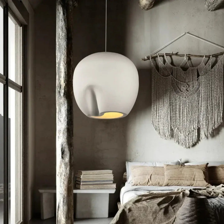 Suspension luminaire en forme sphérique pliée d’un côté
