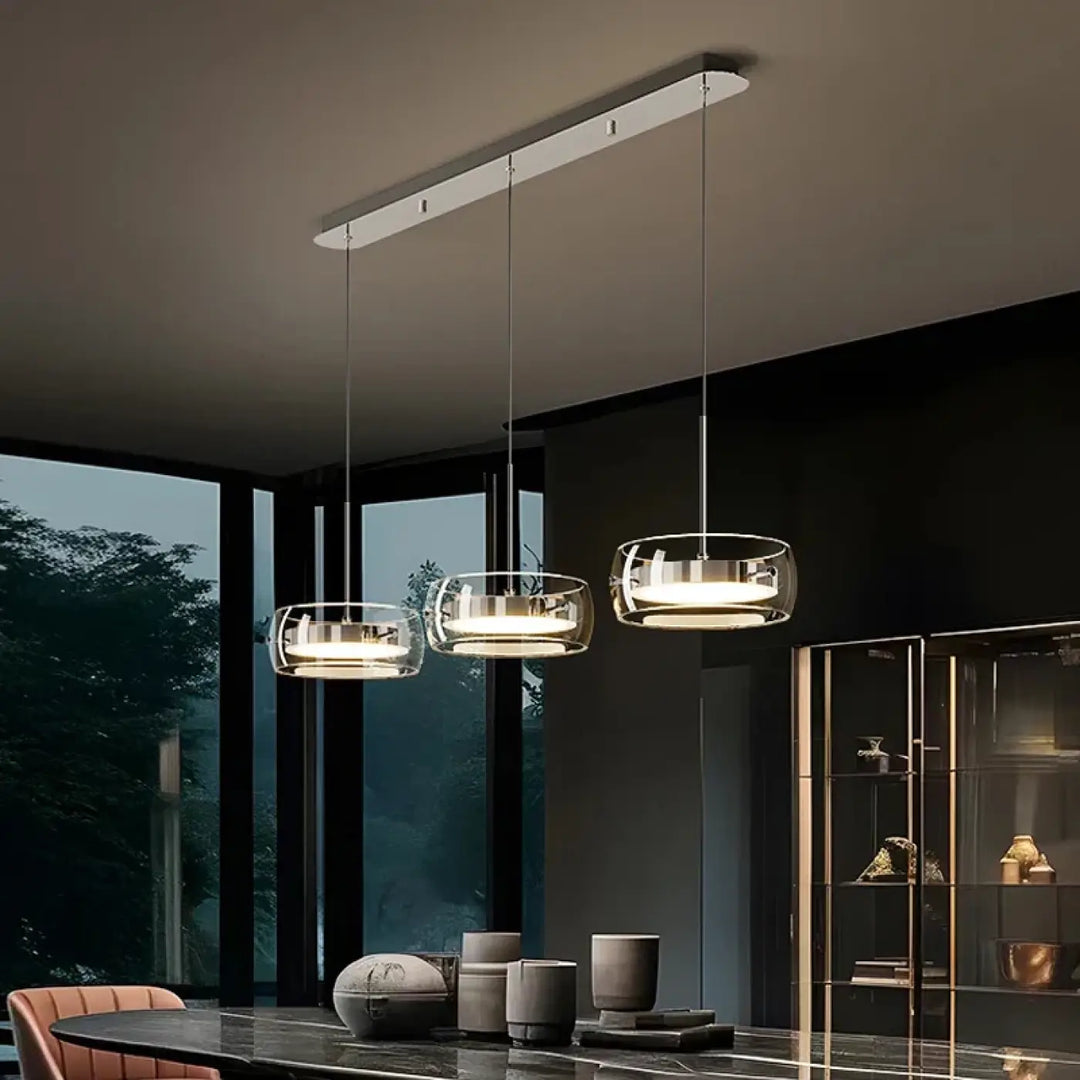 Suspension luminaire simpa avec abat-jours en verre clair et supports métalliques modernes suspendus au plafond blanc