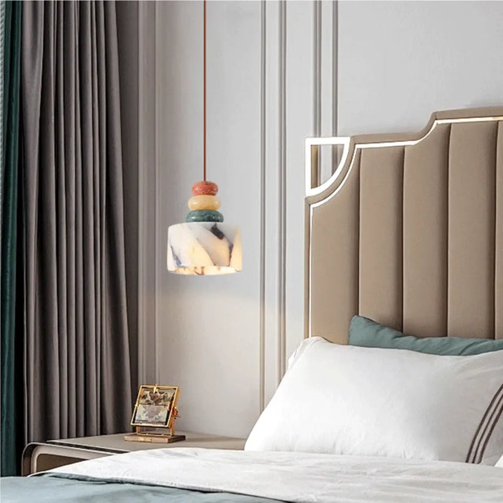 Suspension luminaire en pierre naturelle colorée aspect brut