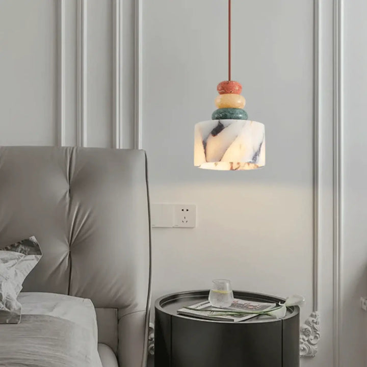 Suspension luminaire en pierre naturelle colorée aspect brut