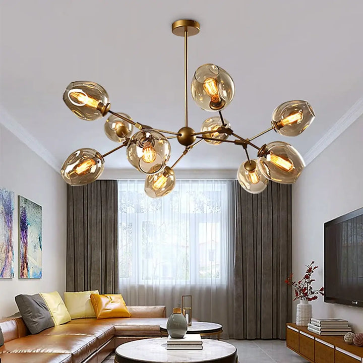 Suspension luminaire alloy en métal doré avec globes en verre ambre et bras articulés vintage à ampoules à filament exposé