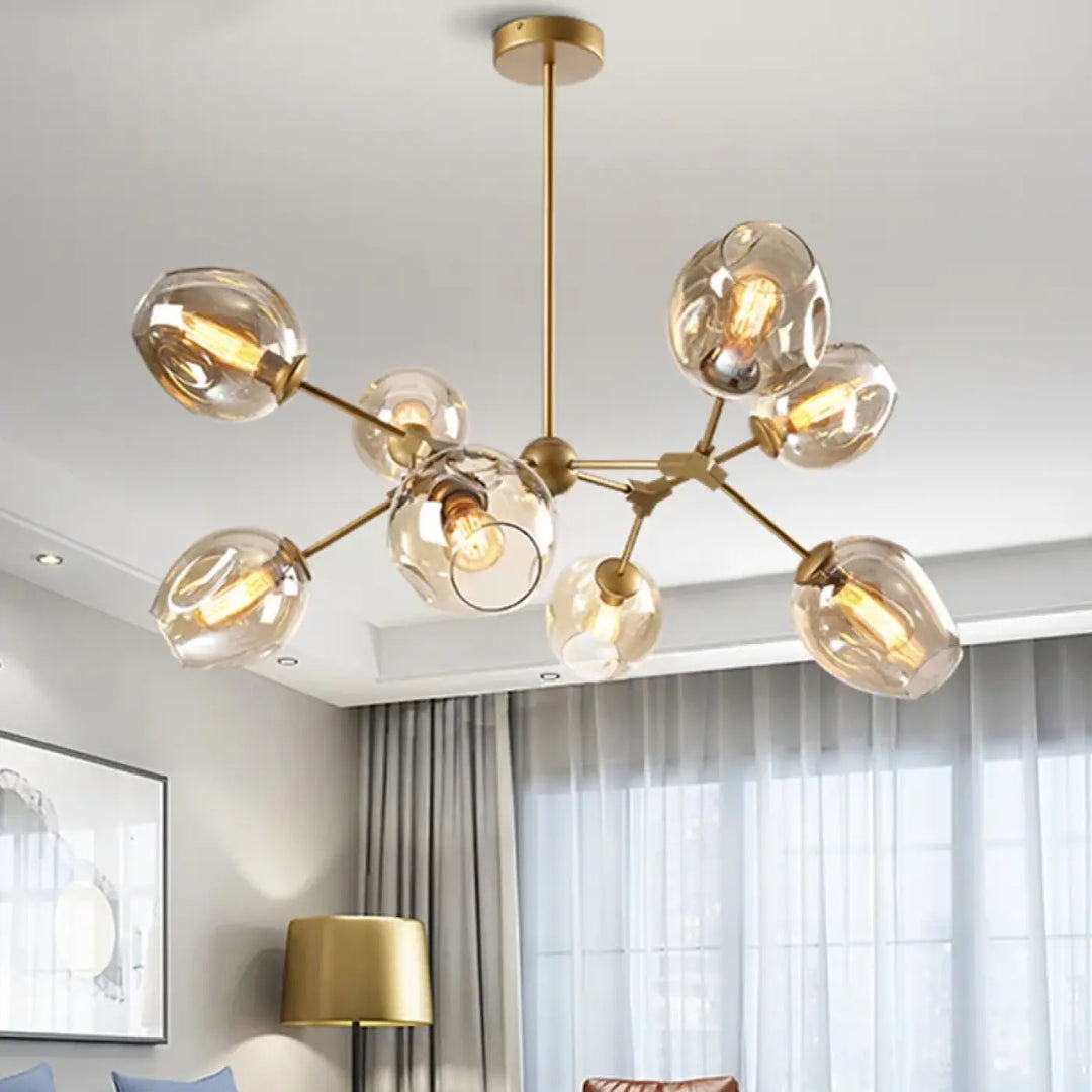 Suspension luminaire alloy en laiton doré avec globes en verre clair et ampoules à filament pour un style bras articulés vintage