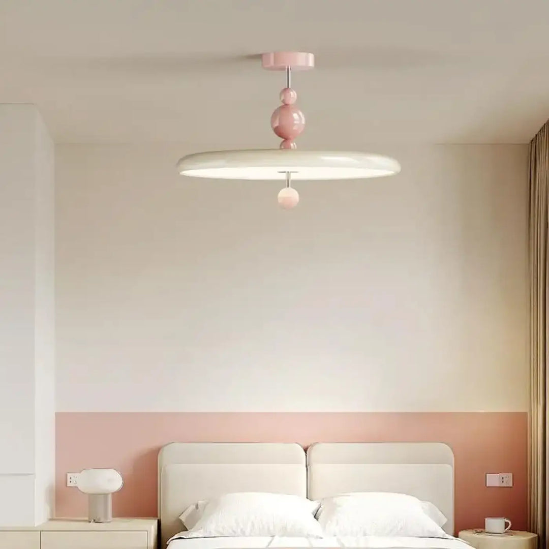 Suspension luminaire tania style contemporain en pastel rose et blanc avec accents sphériques pour univers plus moderne