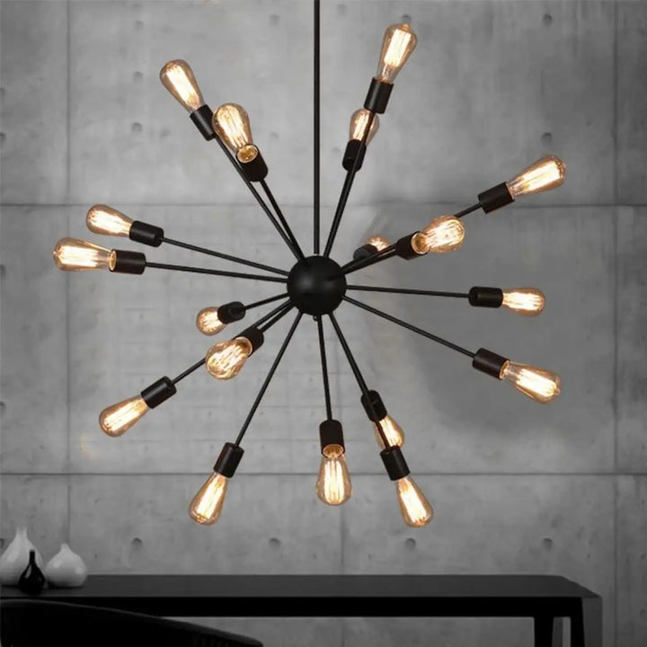 Suspension luminaire spyka en métal noir avec structure géométrique étoile et ampoules filament exposées style moderne