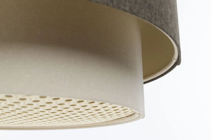 Suspension luminaire graphite en tissu gris avec anneau intérieur crème perforé en rattan duotex ecru