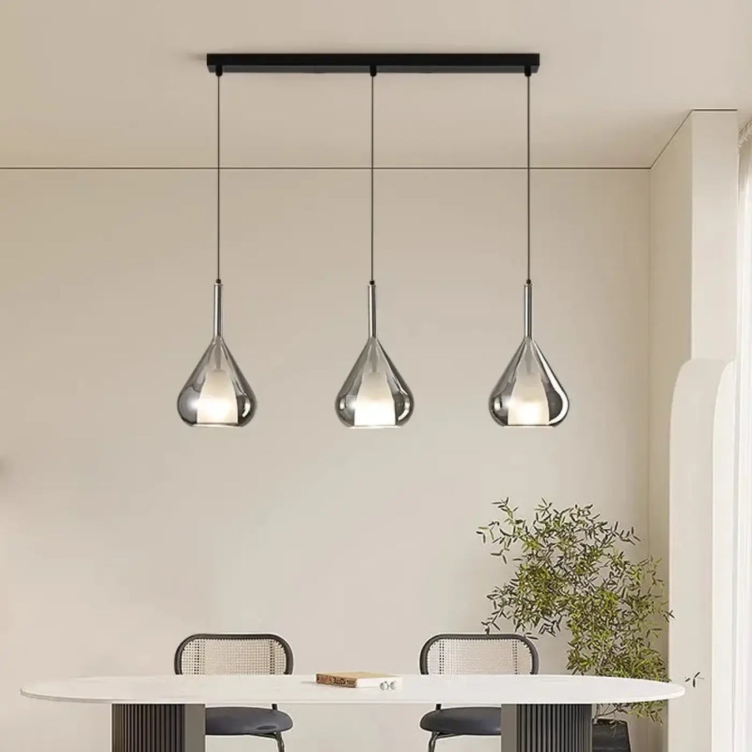 Suspension luminaire pirula avec trois suspensions chromées en teardrop pour éclairage blanc froid ou blanc chaud mètres carrés