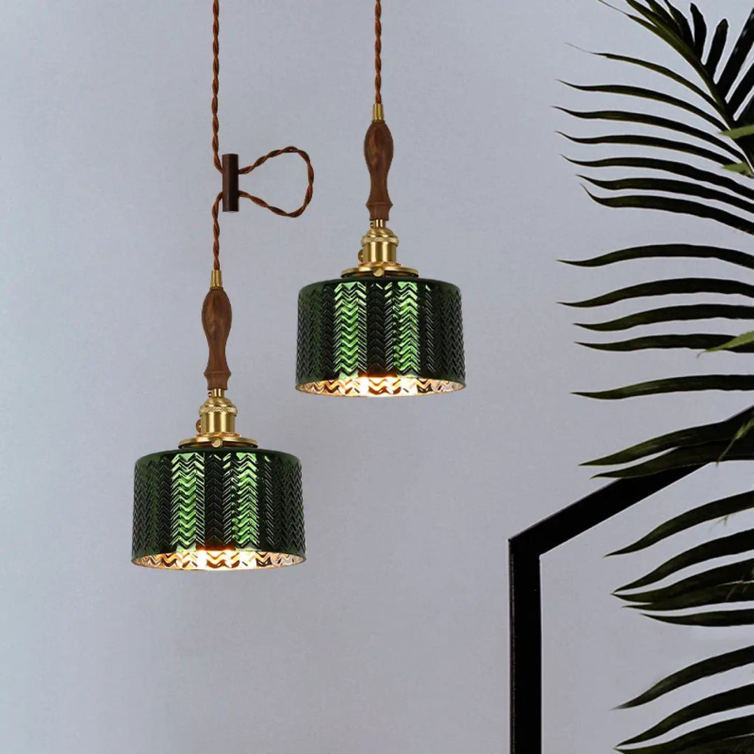 Suspension vert foncé avec détail cuivre et bois chic
