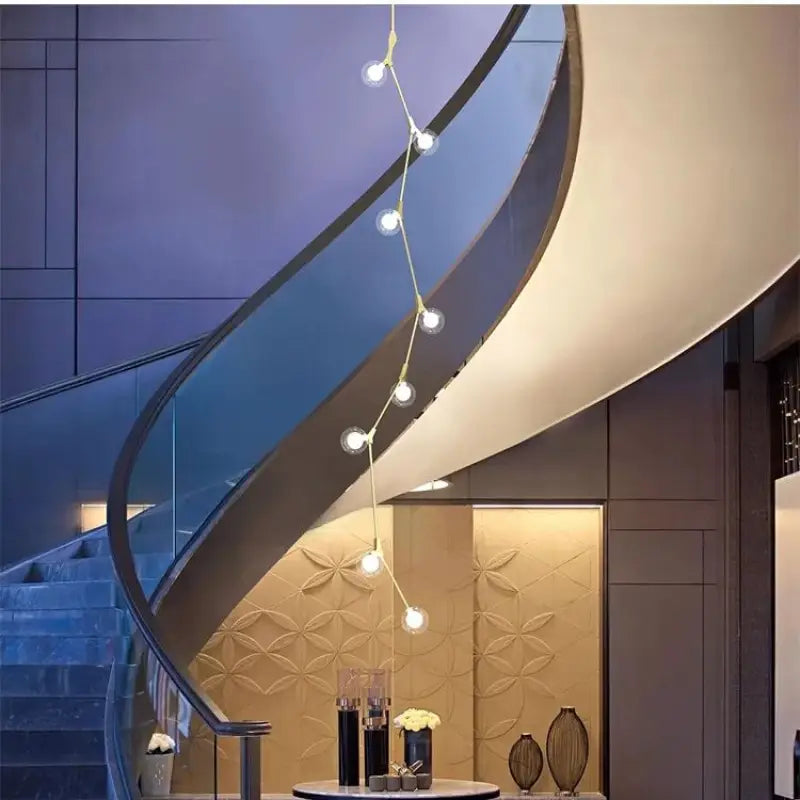 Suspension luminaire verticale en boules opales et laiton