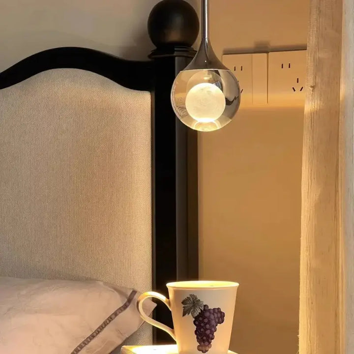 Suspension Moderne LED Goutte Cristal Et Fer Forgé Élégante

