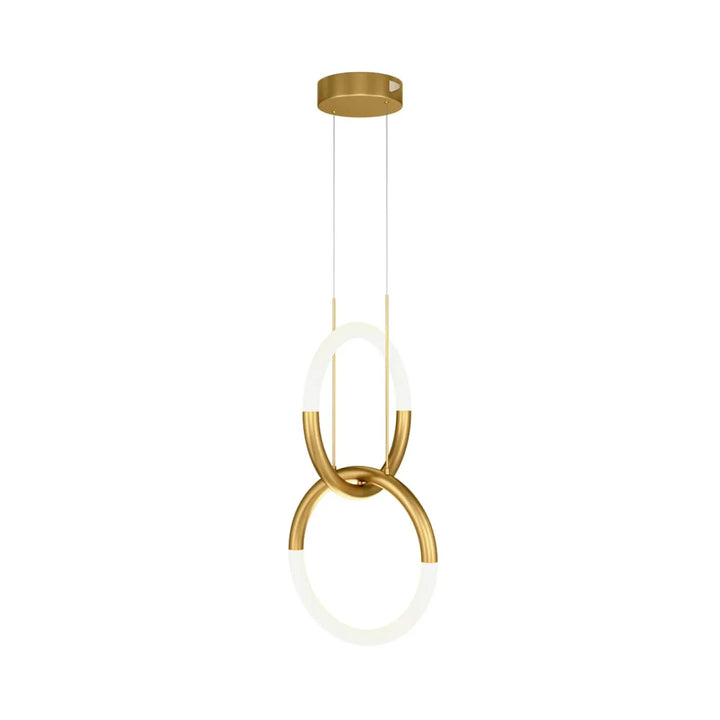 Suspension luminaire double anneau en aluminium doré avec deux anneaux entrelacés au-dessus d’une table moderne