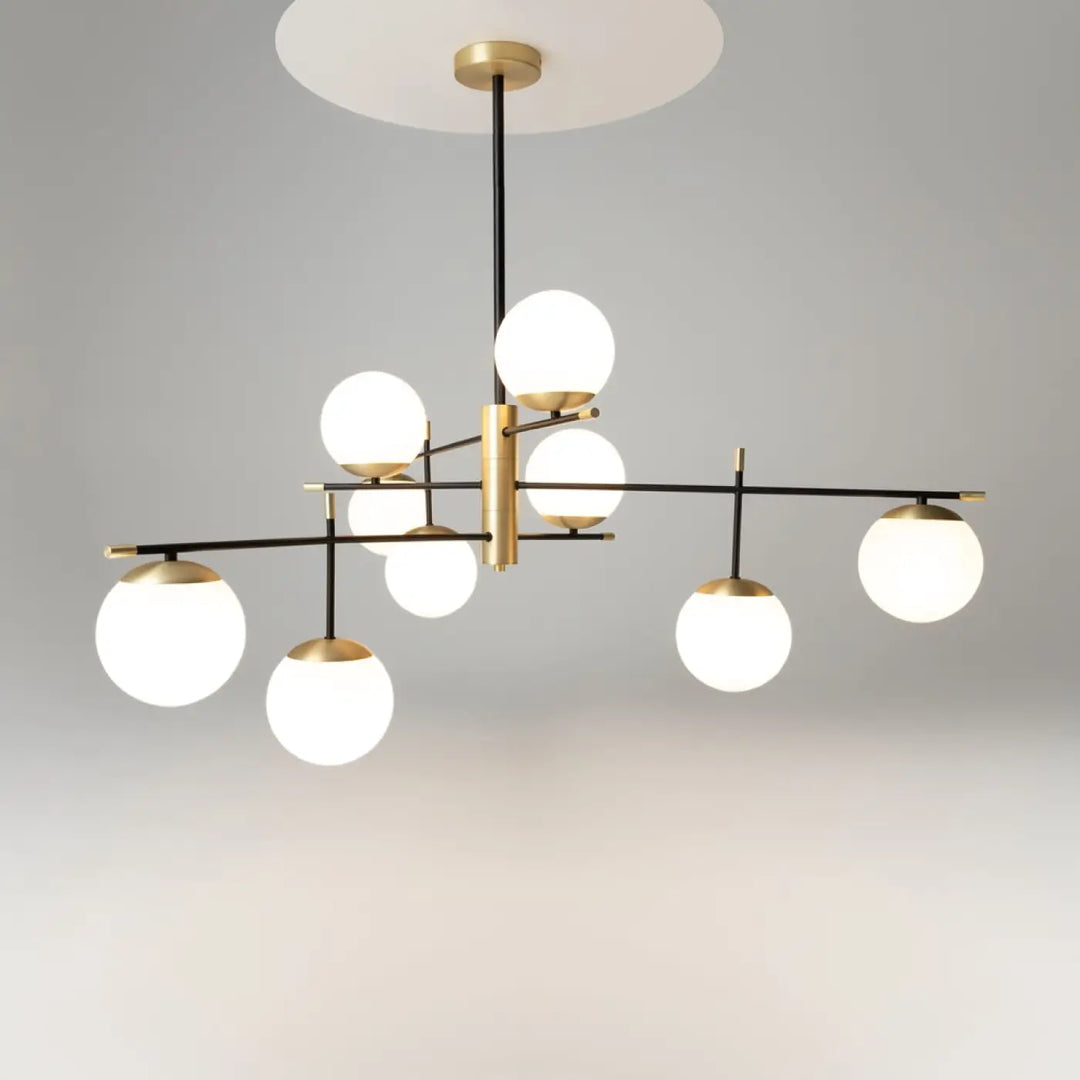 Suspension luminaire nostalgia xxl en acier noir avec neuf globes en verre dépoli et accents dorés modernes