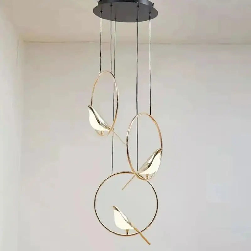 Suspension oiseaux dorés design cercle élégant style moderne poétique
