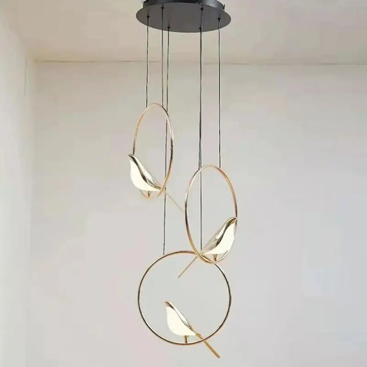 Suspension oiseaux dorés design cercle élégant style moderne poétique