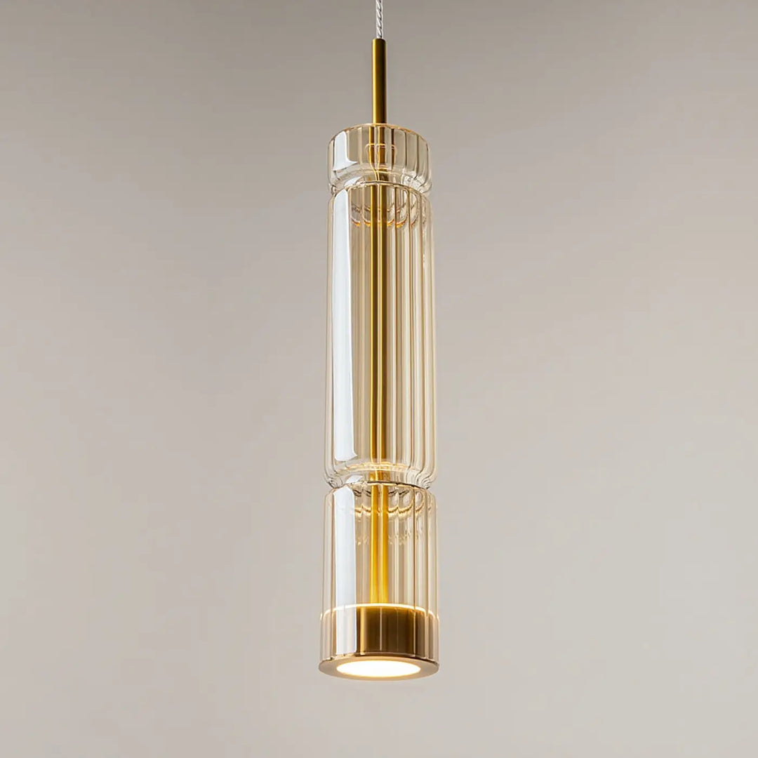 Suspension ordo led avec design cylindrique moderne en verre clair et accents métalliques dorés pour éclairage contemporain