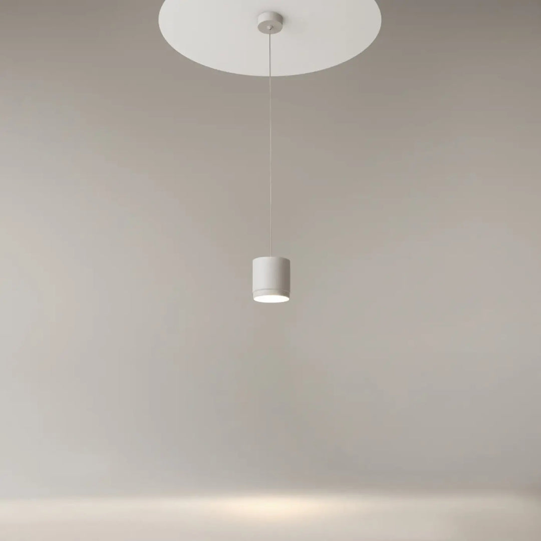 Luminaire suspension polar petit disque blanc cylindrique minimaliste design moderne suspendu au plafond