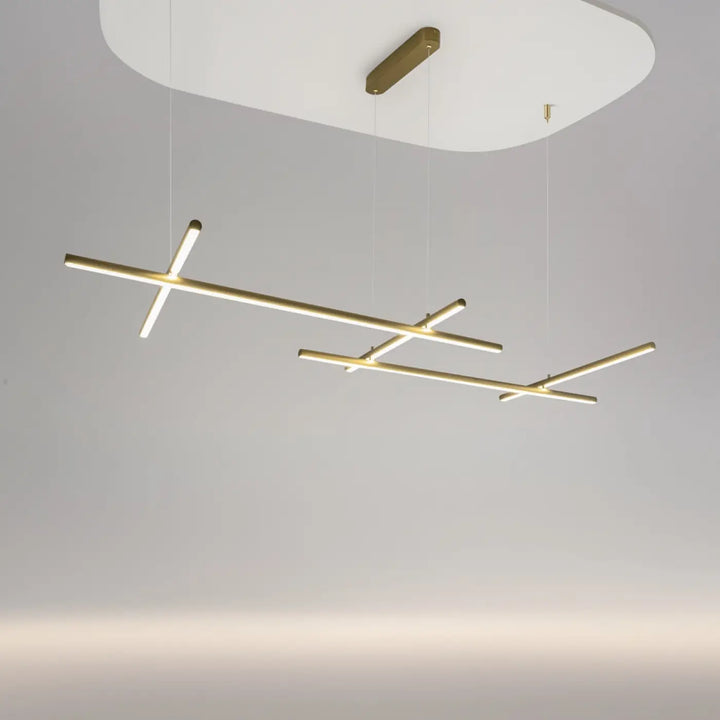 Suspension radiance ramification dorée en trois longueurs avec design linéaire minimaliste en métal doré moderne