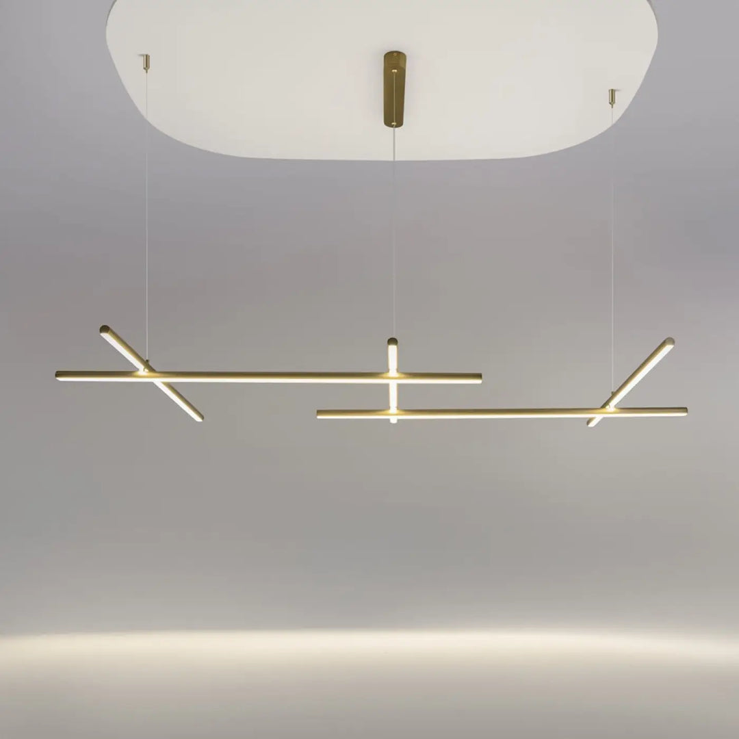 Suspension radiance ramification dorée avec trois longueurs, design minimaliste et éclairage led chaud