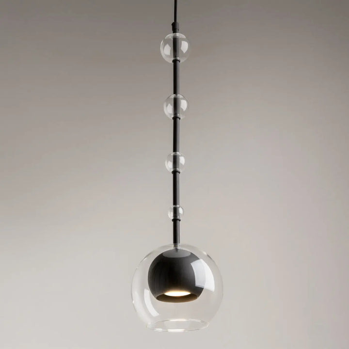 Suspension ros en verre noir et clair avec diffuseur vertical et culot gu10 design sphérique moderne
