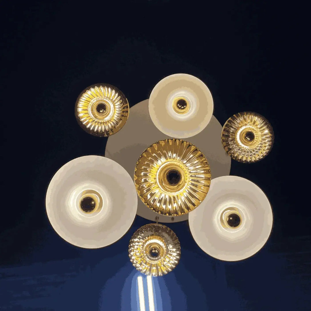 Suspension luminaire grace 7 lumières avec rosace grace en verre soufflé et points lumineux dorés et ivoire asymétrique