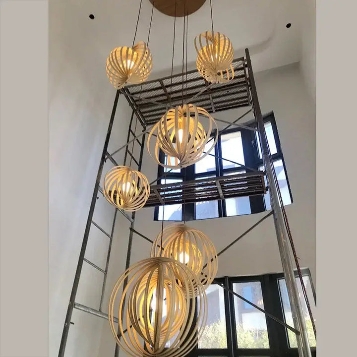 Suspension sphérique en bois ajouré style scandinave moderne

