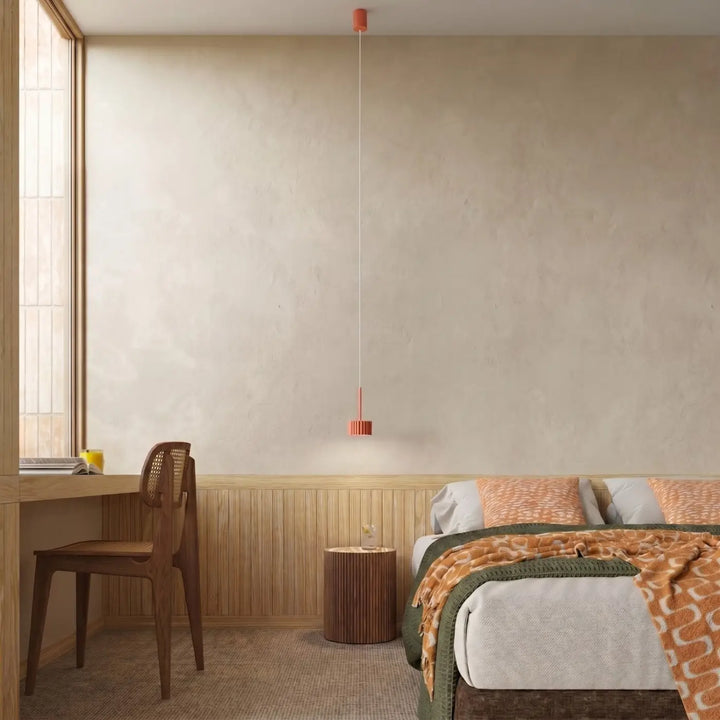 Suspension Aura pêche à spot cannelé dans une chambre